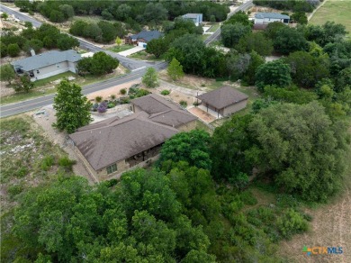 Located in the picturesque lake community of Lago Vista, this on Highland Lakes Golf Course in Texas - for sale on GolfHomes.com, golf home, golf lot