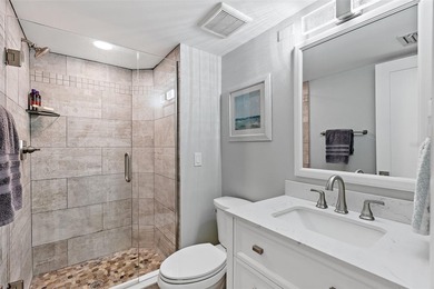 One or more photo(s) has been virtually staged. Experience on Isla Del Sol Yacht and Country Club in Florida - for sale on GolfHomes.com, golf home, golf lot