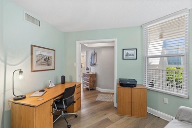 One or more photo(s) has been virtually staged. Experience on Isla Del Sol Yacht and Country Club in Florida - for sale on GolfHomes.com, golf home, golf lot