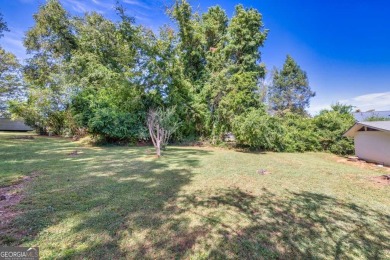 Charming and full of character, this historic 4-sided brick on Chicopee Woods Golf Course in Georgia - for sale on GolfHomes.com, golf home, golf lot