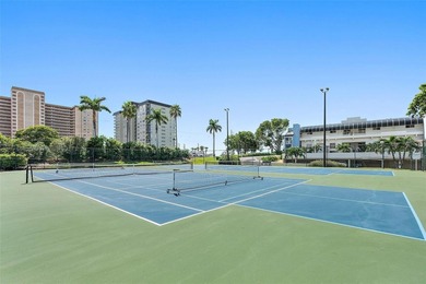 One or more photo(s) has been virtually staged. Experience on Isla Del Sol Yacht and Country Club in Florida - for sale on GolfHomes.com, golf home, golf lot