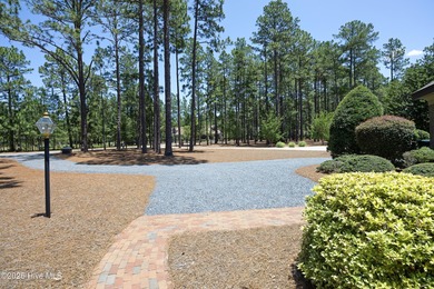 Lovely golf front home located in Pinewild that features mostly on Pinewild Country Club of Pinehurst in North Carolina - for sale on GolfHomes.com, golf home, golf lot