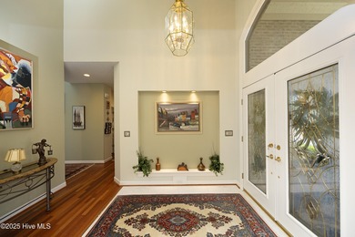 Lovely golf front home located in Pinewild that features mostly on Pinewild Country Club of Pinehurst in North Carolina - for sale on GolfHomes.com, golf home, golf lot