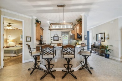 Stunning WATERFRONT Savoy model with breathtaking direct sight on Stonegate Golf Club in Florida - for sale on GolfHomes.com, golf home, golf lot