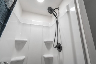 Completely Updated 2 Bedroom 2 Bathroom End-Unit In Desirable on Minerals Golf Club in New Jersey - for sale on GolfHomes.com, golf home, golf lot