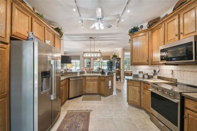 Stunning WATERFRONT Savoy model with breathtaking direct sight on Stonegate Golf Club in Florida - for sale on GolfHomes.com, golf home, golf lot