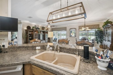 Stunning WATERFRONT Savoy model with breathtaking direct sight on Stonegate Golf Club in Florida - for sale on GolfHomes.com, golf home, golf lot