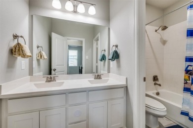 STUNNING Highland built home nestled in lakeside & golf resort on The Tribute At the Colony in Texas - for sale on GolfHomes.com, golf home, golf lot