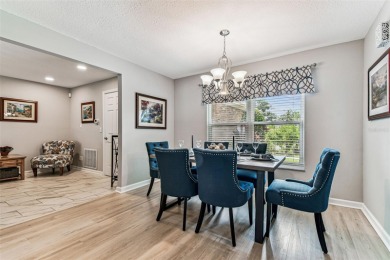 The minute you walk through the door of this gorgeous Highland on Highland Lakes Executive Golf Course in Florida - for sale on GolfHomes.com, golf home, golf lot
