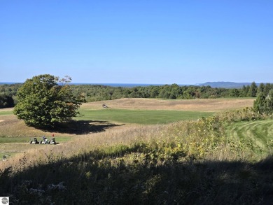 This prime hill top lot provides sweeping views of Champion Hill on Champion Hill Golf Club in Michigan - for sale on GolfHomes.com, golf home, golf lot