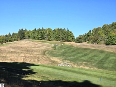 This prime hill top lot provides sweeping views of Champion Hill on Champion Hill Golf Club in Michigan - for sale on GolfHomes.com, golf home, golf lot