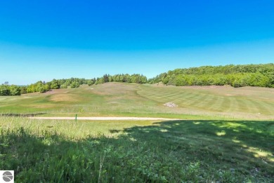 This prime hill top lot provides sweeping views of Champion Hill on Champion Hill Golf Club in Michigan - for sale on GolfHomes.com, golf home, golf lot