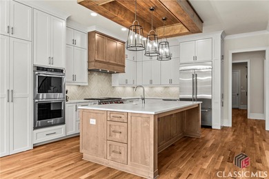 Luxury and comfort in this extraordinary 6 bedroom, 6.5 bath on The Georgia Club in Georgia - for sale on GolfHomes.com, golf home, golf lot