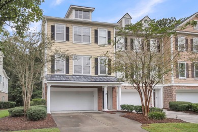 Tucked behind the exclusive gates of Dunes West, 129 Palm Cove on Dunes West Golf Club in South Carolina - for sale on GolfHomes.com, golf home, golf lot
