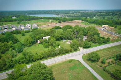 Commercial land with house and barn that has gone through the on Lakeside Hills Golf Course in Kansas - for sale on GolfHomes.com, golf home, golf lot