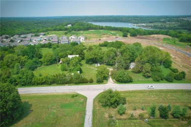 Commercial land with house and barn that has gone through the on Lakeside Hills Golf Course in Kansas - for sale on GolfHomes.com, golf home, golf lot