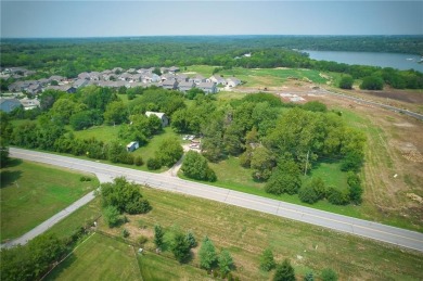 Commercial land with house and barn that has gone through the on Lakeside Hills Golf Course in Kansas - for sale on GolfHomes.com, golf home, golf lot