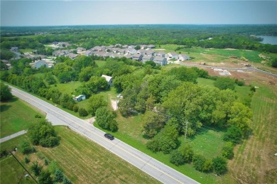 Commercial land with house and barn that has gone through the on Lakeside Hills Golf Course in Kansas - for sale on GolfHomes.com, golf home, golf lot