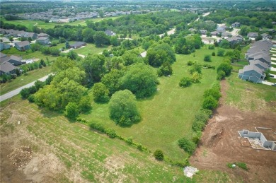 Commercial land with house and barn that has gone through the on Lakeside Hills Golf Course in Kansas - for sale on GolfHomes.com, golf home, golf lot