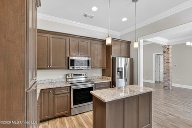 This beautifully maintained 3-bedroom, 2-bath home is perfectly on Diamondhead Country Club in Mississippi - for sale on GolfHomes.com, golf home, golf lot