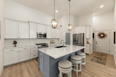 Welcome to effortless luxury living with views that steal the on Shawnee Golf and Country Club in Kansas - for sale on GolfHomes.com, golf home, golf lot