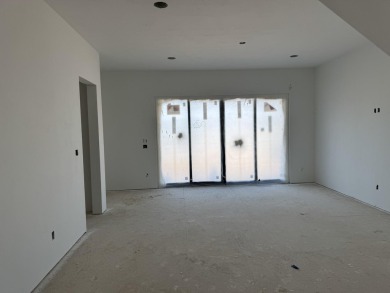 Discover the epitome of low-maintenance luxury in this stunning on The Golf Club At Redlands Mesa in Colorado - for sale on GolfHomes.com, golf home, golf lot
