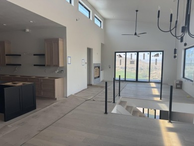 Discover the epitome of low-maintenance luxury in this stunning on The Golf Club At Redlands Mesa in Colorado - for sale on GolfHomes.com, golf home, golf lot