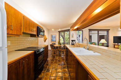 Located within the established Kanaloa at Kona resort community on Kona Country Club Golf Course in Hawaii - for sale on GolfHomes.com, golf home, golf lot