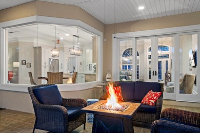 Experience refined coastal living at 463 Captains Circle, a on Regatta Bay Golf and Country Club in Florida - for sale on GolfHomes.com, golf home, golf lot
