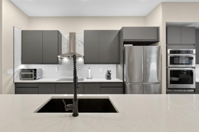 Experience the best of modern Florida living in this custom on Palm Harbor Golf Club in Florida - for sale on GolfHomes.com, golf home, golf lot