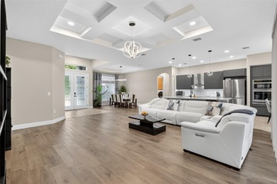 Experience the best of modern Florida living in this custom on Palm Harbor Golf Club in Florida - for sale on GolfHomes.com, golf home, golf lot