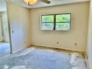 This rare 1 bed/1 bath, first floor end unit is waiting for you on On Top Of The World Golf Course in Florida - for sale on GolfHomes.com, golf home, golf lot