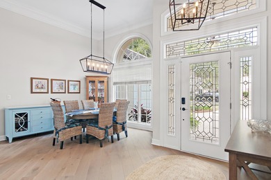 Experience refined coastal living at 463 Captains Circle, a on Regatta Bay Golf and Country Club in Florida - for sale on GolfHomes.com, golf home, golf lot