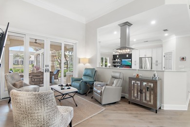 Experience refined coastal living at 463 Captains Circle, a on Regatta Bay Golf and Country Club in Florida - for sale on GolfHomes.com, golf home, golf lot