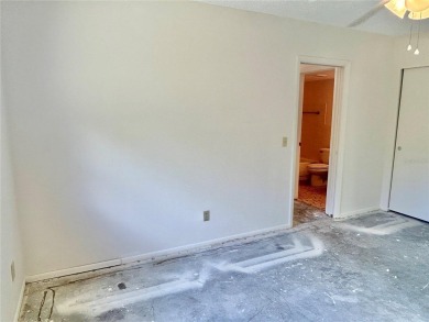 This rare 1 bed/1 bath, first floor end unit is waiting for you on On Top Of The World Golf Course in Florida - for sale on GolfHomes.com, golf home, golf lot