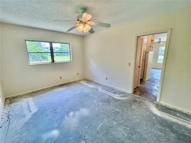 This rare 1 bed/1 bath, first floor end unit is waiting for you on On Top Of The World Golf Course in Florida - for sale on GolfHomes.com, golf home, golf lot
