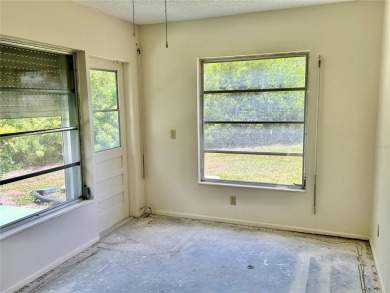 This rare 1 bed/1 bath, first floor end unit is waiting for you on On Top Of The World Golf Course in Florida - for sale on GolfHomes.com, golf home, golf lot