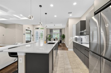 Experience the best of modern Florida living in this custom on Palm Harbor Golf Club in Florida - for sale on GolfHomes.com, golf home, golf lot