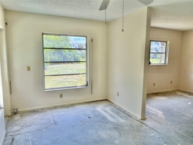 This rare 1 bed/1 bath, first floor end unit is waiting for you on On Top Of The World Golf Course in Florida - for sale on GolfHomes.com, golf home, golf lot