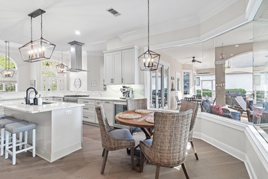 Experience refined coastal living at 463 Captains Circle, a on Regatta Bay Golf and Country Club in Florida - for sale on GolfHomes.com, golf home, golf lot