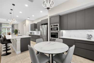 Experience the best of modern Florida living in this custom on Palm Harbor Golf Club in Florida - for sale on GolfHomes.com, golf home, golf lot