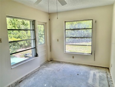 This rare 1 bed/1 bath, first floor end unit is waiting for you on On Top Of The World Golf Course in Florida - for sale on GolfHomes.com, golf home, golf lot