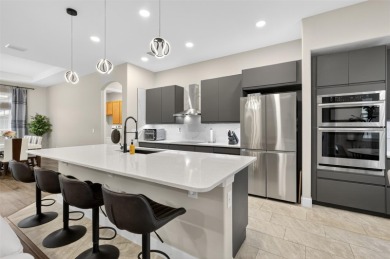 Experience the best of modern Florida living in this custom on Palm Harbor Golf Club in Florida - for sale on GolfHomes.com, golf home, golf lot