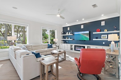 Experience refined coastal living at 463 Captains Circle, a on Regatta Bay Golf and Country Club in Florida - for sale on GolfHomes.com, golf home, golf lot