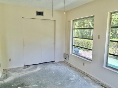This rare 1 bed/1 bath, first floor end unit is waiting for you on On Top Of The World Golf Course in Florida - for sale on GolfHomes.com, golf home, golf lot