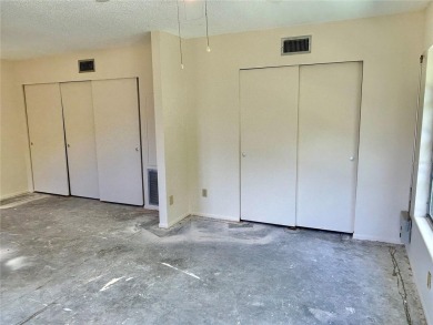 This rare 1 bed/1 bath, first floor end unit is waiting for you on On Top Of The World Golf Course in Florida - for sale on GolfHomes.com, golf home, golf lot