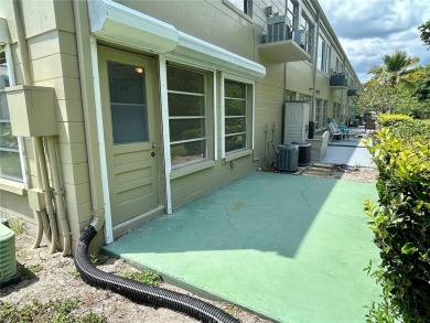 This rare 1 bed/1 bath, first floor end unit is waiting for you on On Top Of The World Golf Course in Florida - for sale on GolfHomes.com, golf home, golf lot