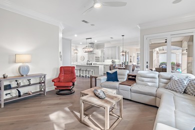 Experience refined coastal living at 463 Captains Circle, a on Regatta Bay Golf and Country Club in Florida - for sale on GolfHomes.com, golf home, golf lot