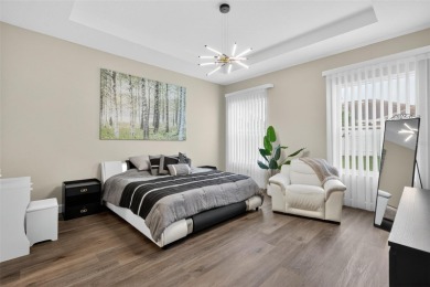 Experience the best of modern Florida living in this custom on Palm Harbor Golf Club in Florida - for sale on GolfHomes.com, golf home, golf lot