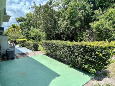 This rare 1 bed/1 bath, first floor end unit is waiting for you on On Top Of The World Golf Course in Florida - for sale on GolfHomes.com, golf home, golf lot